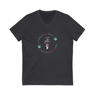 Dog Hair is my Glitter Unisex Jersey V-Neck Tee in Dark Grey Heather. The Dog Hair is my Glitter design features a dog with the phrase "Dog Hair is my Glitter" above it and it is surrounded by a circle with paw prints.