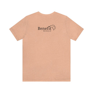 Signature Tattoo Flowers Unisex Jersey Short Sleeve Tee in Heather Peach. Shown is back of shirt with the Benefit Beagle Logo. Front of shirt has the Signature Tattoo Flowers design featuring a dog with flowers around it and the phrase "Beagletude" and "Nothing is Impawssible".