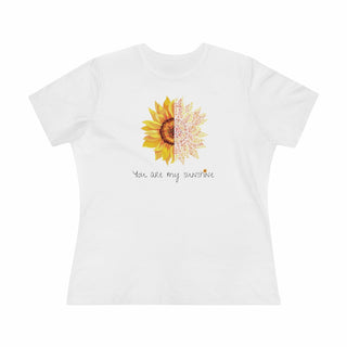 You are my Sunshine Women's Premium Tee shirt in White. Shown is the front showcasing a sunflower which is split down the middle and half is made out of paw prints. Underneath is the phrase "You are my Sunshine" . Back of shirt features the Sunflower Benefit Beagle Logo.