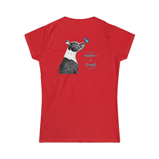 Lincoln Butterfly Women's Softstyle Tee in Red. Shown is back of shirt design showcasing profile of a dog with a blue butterfly on its nose and the phrase "Kindness is Strength" next to it. The front of shirt has Benefit Beagle Logo kissed by a Butterfly.