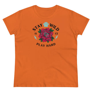 Stay Wild Women's Midweight Cotton Tee in Orange. Shown is front of Stay Wild Design features a tattoo style rose with the phrase "Stay Wild, Play Hard" around it. The back of shirt features the Stay Wild Benefit Beagle Logo Design.