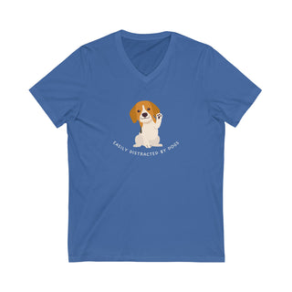 Easily Distracted Unisex Jersey Short Sleeve V-Neck Tee in True Royal. Shown is front design featuring a dog waving with the saying "Easily Distracted by Dogs" below it. The back of shirt has the classic Benefit Beagle Logo.