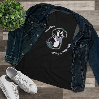 Signature Tattoo Flowers Women's Premium Tee in Black. Shown is front of shirt with the Signature Tattoo Flowers design featuring a dog with flowers around it and the phrase "Beagletude" and "Nothing is Impawssible". Back of shirt features the Benefit Beagle Logo.