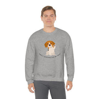 Easily Distracted Unisex Heavy Blend Crewneck Sweatshirt in Sport Grey. Shown is front design featuring a dog waving with the saying "Easily Distracted by Dogs" below it. The back of shirt has the classic Benefit Beagle Logo.