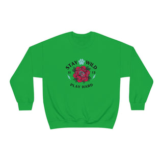 Stay Wild Unisex Heavy Blend Crewneck Sweatshirt in Irish Green.  The Stay Wild Design features a tattoo style rose with the phrase "Stay Wild, Play Hard" around it. The back of shirt features the Stay Wild Benefit Beagle Logo Design.