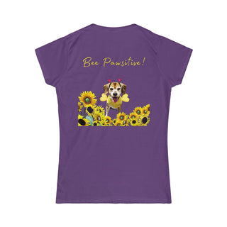 Bee Pawsitive Women's Softstyle Tee in Purple. Shown is back of shirt showcasing a dog dressed as as bee in a a field of sunflowers with the phrase "Bee Pawsitive!" above it. The front features the Bee Pawsitive Benefit Beagle Logo.