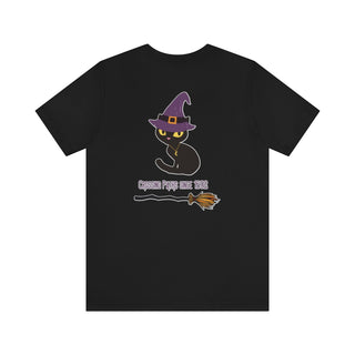 Witchy Cat Unisex Jersey Short Sleeve Tee. Back side shown in Black with Wide Eyed Cartoon Cat wearing Purple Hat Standing over Broom. "Crossing Paths Since 1692". On the front of shirt is similar Witchy Benefit Beagle Logo. Purrfect for Halloween, or anytime!