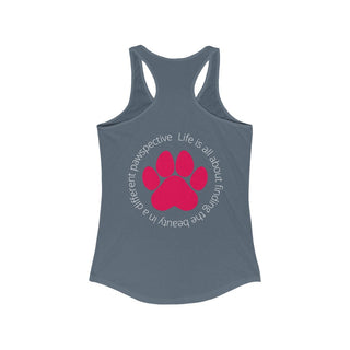 Different Pawspective Women's Racerback Tank in Indigo. Shown is the back of shirt featuring a large colorful pawprint with the the phrase "Life is all about finding the beauty in a different pawspective" circled around it. The Benefit Beagle Logo is located in the top corner on the front of shirt.