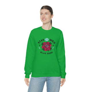 Stay Wild Unisex Heavy Blend Crewneck Sweatshirt in Irish Green. The Stay Wild Design features a tattoo style rose with the phrase "Stay Wild, Play Hard" around it. The back of shirt features the Stay Wild Benefit Beagle Logo Design.