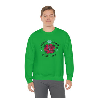 Stay Wild Unisex Heavy Blend Crewneck Sweatshirt in Irish Green. The Stay Wild Design features a tattoo style rose with the phrase "Stay Wild, Play Hard" around it. The back of shirt features the Stay Wild Benefit Beagle Logo Design.