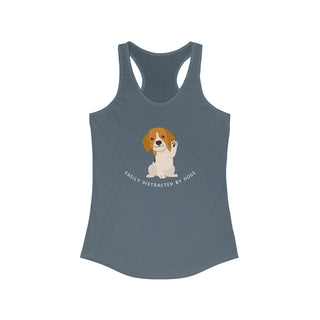 Easily Distracted Women's Racerback Tank in Indigo. Shown is front design featuring a dog waving with the saying "Easily Distracted by Dogs" below it. The back of shirt has the classic Benefit Beagle Logo.