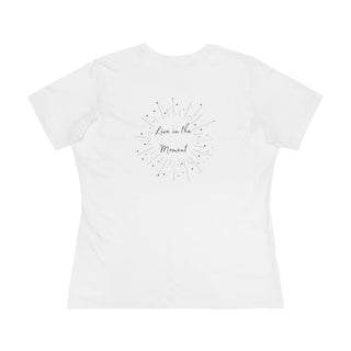 Live in the Moment Women's Premium Tee in White. The Live in the Moment design features a graphic on the back with the phrase "Live in the Moment" surrounded by shooting stars.