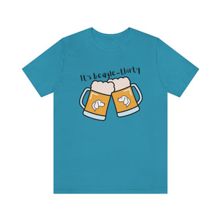 Beagle-Thirty Mugs Unisex Jersey Short Sleeve Tee in Aqua. The front of shirt showcases Two Dog Adorned Mugs clinking with the saying, "It's Beagle-Thirty" above it. Back of shirt features corresponding Benefit Beagle Logo.