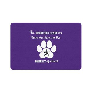 Brightest Star pet food mat in Purple. The Brightest Star design features a design on the back with the phrase "The brightest stars are those who shine for the benefit of others" with a pawprint and a nautical star.