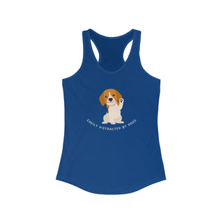 Easily Distracted Women's Racerback Tank in Royal. Shown is front design featuring a dog waving with the saying "Easily Distracted by Dogs" below it. The back of shirt has the classic Benefit Beagle Logo.