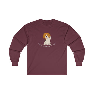 Easily Distracted Ultra Cotton Long Sleeve Tee in Maroon. Shown is front design featuring a dog waving with the saying "Easily Distracted by Dogs" below it. The back of shirt has the classic Benefit Beagle Logo.