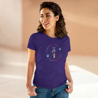 Dog Hair is my Glitter Women's Midweight Cotton Tee in Purple. The Dog Hair is my Glitter design features a dog with the phrase "Dog Hair is my Glitter" above it and it is surrounded by a circle with paw prints.