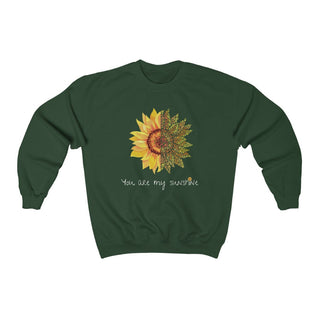 You are my Sunshine Unisex Crewneck Sweatshirt in Forest Green. Shown is the front showcasing a sunflower which is split down the middle and half is made out of paw prints. Underneath is the phrase "You are my Sunshine" . Back of shirt features the Sunflower Benefit Beagle Logo.