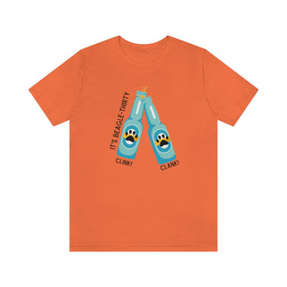 Beagle-Thirty Bottles Unisex Jersey Short Sleeve Tee in Orange. The front of shirt showcases Two Paw Labeled Bottles clinking with the saying, "It's Beagle-Thirty". Back of shirt features corresponding Benefit Beagle Logo.