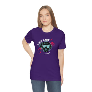 Play Hard Unisex Jersey Short Sleeve Tee Shirt in Team Purple. The design features a cool dog with sunglasses and lightening bolts arond it. The phrase "Live Fast, Play Hard" is around the design.