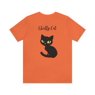 Meow Unisex Tee in Yellow. Shown is back showcasing a wide eyed black cartoon cat with the phrase "Chatty Cat" above it. On front of shirt is the Benefit Beagle Logo featuring a peeping cat.