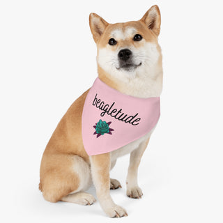 Dog wearing the Signature Tattoo Roses Dog Collar Bandana in Pink. The Signature Tattoo Roses design features the word "beagletude" with a tattoo style rose under it. Comes with adjustable black collar.