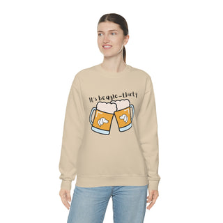 Beagle-Thirty Mugs Unisex Heavy Blend Crewneck Sweatshirt in Sand. The front of shirt showcases Two Dog Adorned Mugs clinking with the saying, "It's Beagle-Thirty" above it. Back of shirt features corresponding Benefit Beagle Logo.