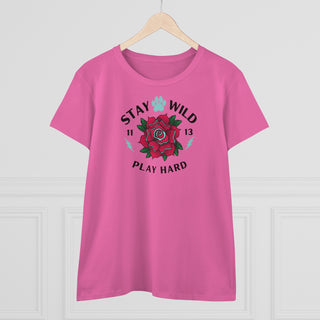 Stay Wild Women's Midweight Cotton Tee in Azalea. Shown is front of Stay Wild Design features a tattoo style rose with the phrase "Stay Wild, Play Hard" around it. The back of shirt features the Stay Wild Benefit Beagle Logo Design.