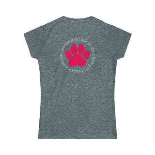 Different Pawspective Women's Softstyle Tee in Dark Heather. Shown is the back of shirt featuring a large colorful pawprint with the the phrase "Life is all about finding the beauty in a different pawspective" circled around it. The Benefit Beagle Logo is located in the top corner on the front of shirt.