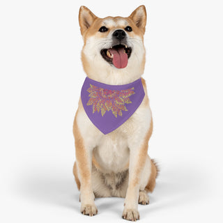 Dog wearing the You are my Sunshine Pet Bandana Collar in Purple. The You are my Sunshine design features half of a sunflower made out of little paw prints. Comes with adjustable black collar.