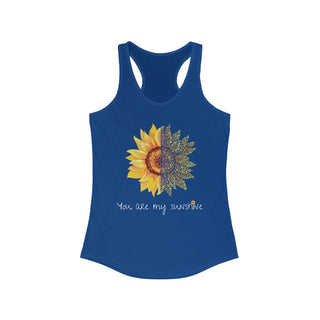 You are my Sunshine Women's Racerback Tank in Royal. Shown is the front showcasing a sunflower which is split down the middle and half is made out of paw prints. Underneath is the phrase "You are my Sunshine" . Back of shirt features the Sunflower Benefit Beagle Logo.