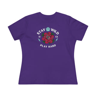 Stay Wild Women's Premium Tee in Team Purple. Shown is front of Stay Wild Design features a tattoo style rose with the phrase "Stay Wild, Play Hard" around it. The back of shirt features the Stay Wild Benefit Beagle Logo Design.