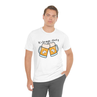 Beagle-Thirty Mugs Unisex Jersey Short Sleeve Tee in White. The front of shirt showcases Two Dog Adorned Mugs clinking with the saying, "It's Beagle-Thirty" above it. Back of shirt features corresponding Benefit Beagle Logo.