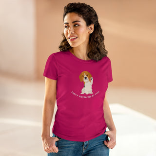 Easily Distracted Women's Midweight Cotton Tee in Team Heliconia Pink. Shown is front design featuring a dog waving with the saying "Easily Distracted by Dogs" below it. The back of shirt has the classic Benefit Beagle Logo.