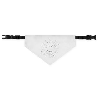 Live in the Moment Dog Collar Bandana in White. The Live in the Moment design features the the phrase "Live in the Moment" surrounded by a circle of shooting stars. Comes with adjustable black collar.