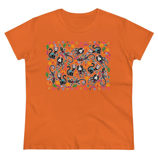 Dia De Los Muertos Women's Midweight Cotton Tee Shirt in Orange. Shown is the front of shirt featuring print of dogs and cats with Dia de los Muertos traditional decorations. On the back is a similar Benefit Beagle Logo.