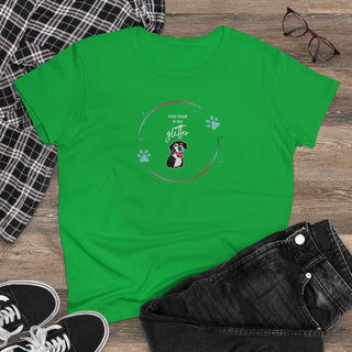 Dog Hair is my Glitter Women's Midweight Cotton Tee in Irish Green. The Dog Hair is my Glitter design features a dog with the phrase "Dog Hair is my Glitter" above it and it is surrounded by a circle with paw prints.