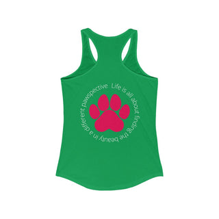 Different Pawspective Women's Racerback Tank in Kelly Green. Shown is the back of shirt featuring a large colorful pawprint with the the phrase "Life is all about finding the beauty in a different pawspective" circled around it. The Benefit Beagle Logo is located in the top corner on the front of shirt.