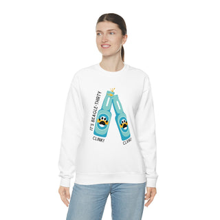 Beagle-Thirty Bottles Unisex Heavy Blend Crewneck Sweatshirt in White. The front of shirt showcases Two Paw Labeled Bottles clinking with the saying, "It's Beagle-Thirty". Back of shirt features corresponding Benefit Beagle Logo.