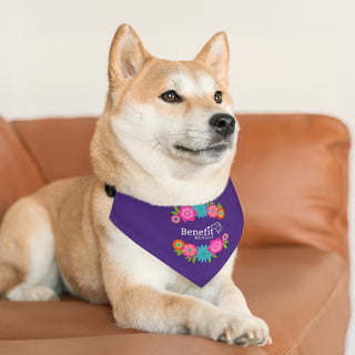 Dog wearing the Dia De Los Muertos Dog Collar Bandana in Purple. The Dia De Los Muertos design features the Benefit Beagle logo with flowers surrounding it. Comes with adjustable black collar.