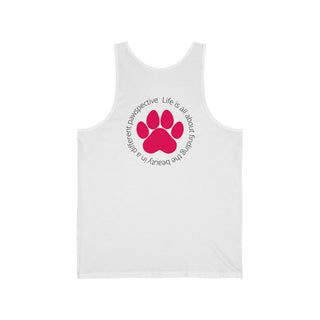 Different Pawspectives Unisex Jersey Tank in White. Shown is the back of shirt featuring a large colorful pawprint with the the phrase "Life is all about finding the beauty in a different pawspective" circled around it. The Benefit Beagle Logo is located in the top corner on the front of shirt.