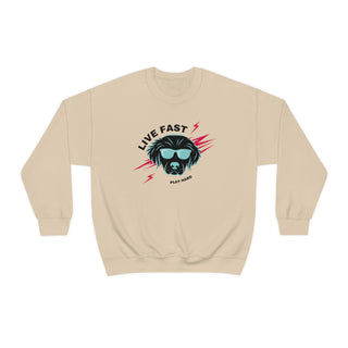 Play Hard Unisex Heavy Blend Crewneck Sweatshirt in Sand. The design features a cool dog with sunglasses and lightening bolts around it. The phrase "Live Fast, Play Hard" is around the design.