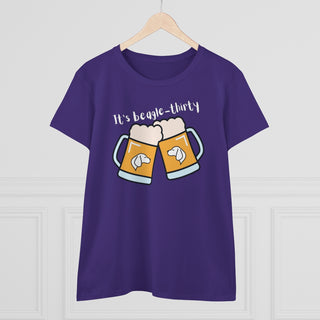 Beagle-Thirty Mugs Women's Midweight Cotton Tee in Purple. The front of shirt showcases Two Dog Adorned Mugs clinking with the saying, "It's Beagle-Thirty" above it. Back of shirt features corresponding Benefit Beagle Logo.