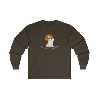 Easily Distracted Ultra Cotton Long Sleeve Tee in Dark Chocolate. Shown is front design featuring a dog waving with the saying "Easily Distracted by Dogs" below it. The back of shirt has the classic Benefit Beagle Logo.