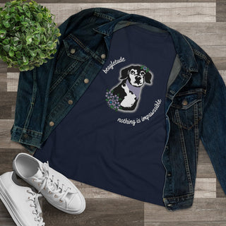 Signature Tattoo Flowers Women's Premium Tee in Navy. Shown is front of shirt with the Signature Tattoo Flowers design featuring a dog with flowers around it and the phrase "Beagletude" and "Nothing is Impawssible". Back of shirt features the Benefit Beagle Logo.