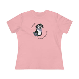 Signature Tattoo Flowers Women's Premium Tee in Pink. Shown is front of shirt with the Signature Tattoo Flowers design featuring a dog with flowers around it and the phrase "Beagletude" and "Nothing is Impawssible". Back of shirt features the Benefit Beagle Logo.