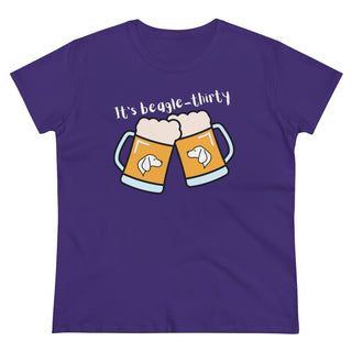 Beagle-Thirty Mugs Women's Midweight Cotton Tee in Purple. The front of shirt showcases Two Dog Adorned Mugs clinking with the saying, "It's Beagle-Thirty" above it. Back of shirt features corresponding Benefit Beagle Logo.