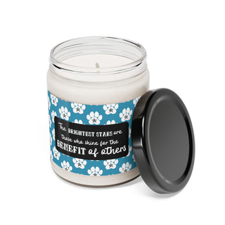 Brightest Stars scented soy candle 9oz. The Brightest Star design features an all-over print of pawprints and a nautical star and the phrase "The brightest stars are those who shine for the benefit of others"  Available in White Sage + Lavender, Clean Cotton, or Sea Salt + Orchid