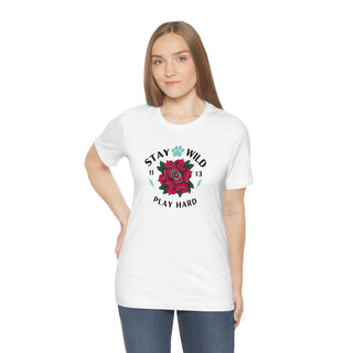 Stay Wild Unisex Premium Tee in White. Shown is front of Stay Wild Design features a tattoo style rose with the phrase "Stay Wild, Play Hard" around it. The back of shirt features the Stay Wild Benefit Beagle Logo Design.