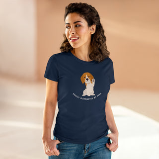 Easily Distracted Women's Midweight Cotton Tee in Team Navy. Shown is front design featuring a dog waving with the saying "Easily Distracted by Dogs" below it. The back of shirt has the classic Benefit Beagle Logo.